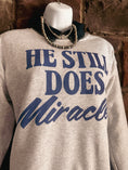 Load image into Gallery viewer, He Still Does Miracles Sweatshirt
